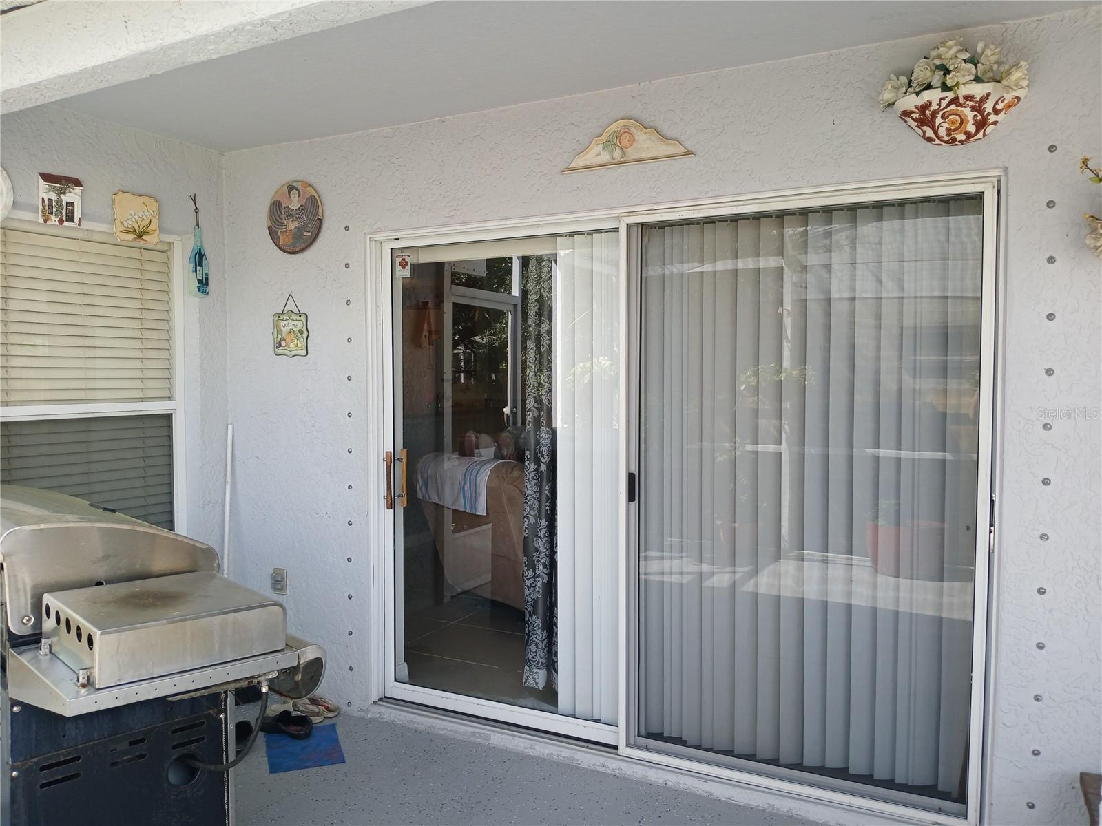 Large glass sliding doors to the lanai..Home includes hurrican shutters.