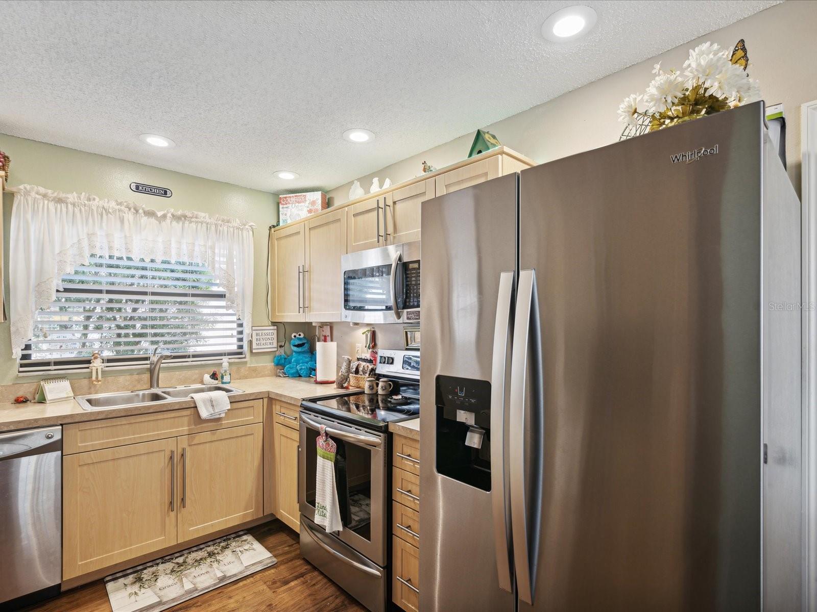 Bright kitchen with Stainless Steel appliances