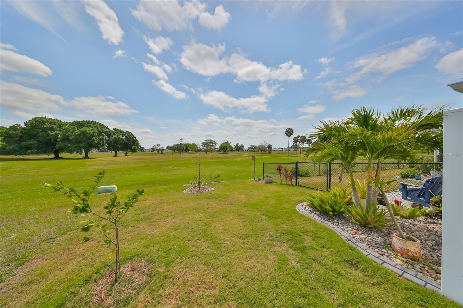 This fenced in backyard is directly overlooking the greenbelt and has lots of new and beautifully landscaped vegetation.