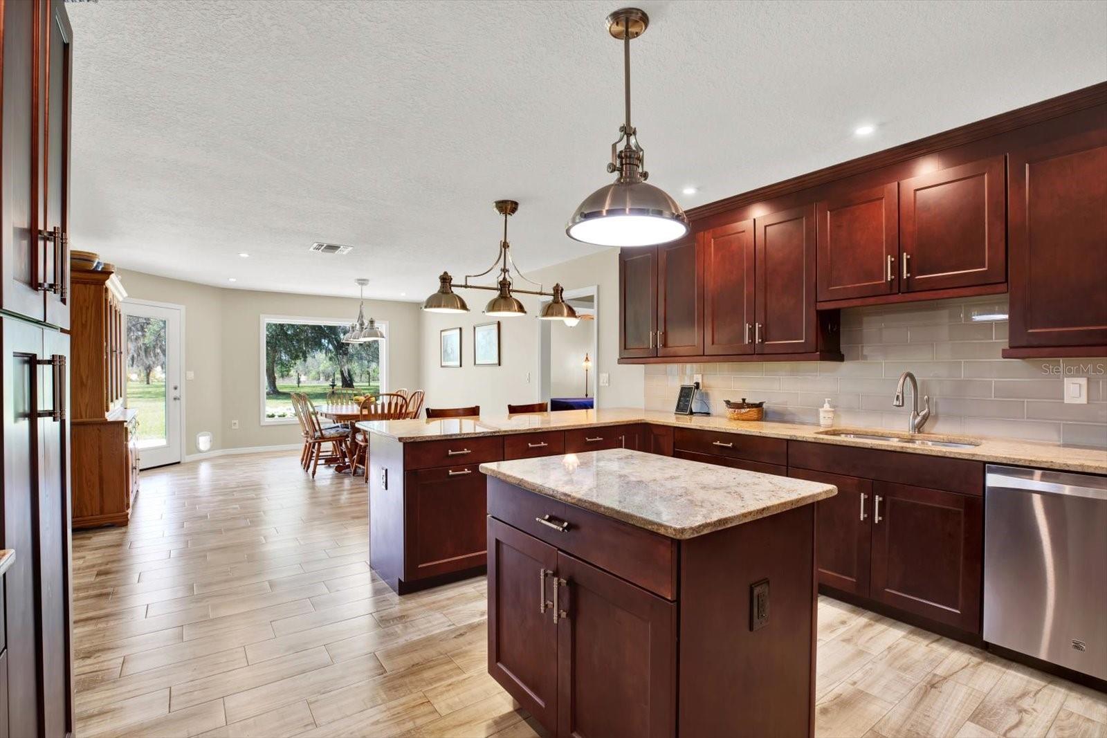 Well Appointed Kitchen with Island and Breakfast Bar
