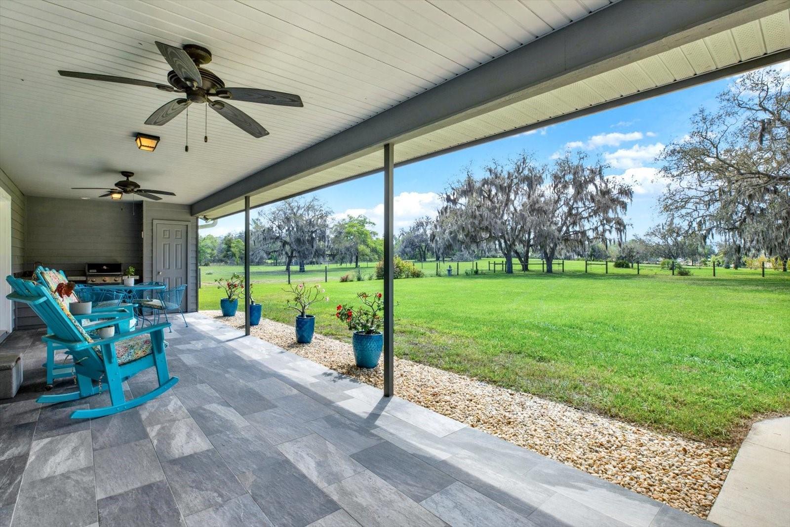 Covered Patio overlooking Landscaped Yard