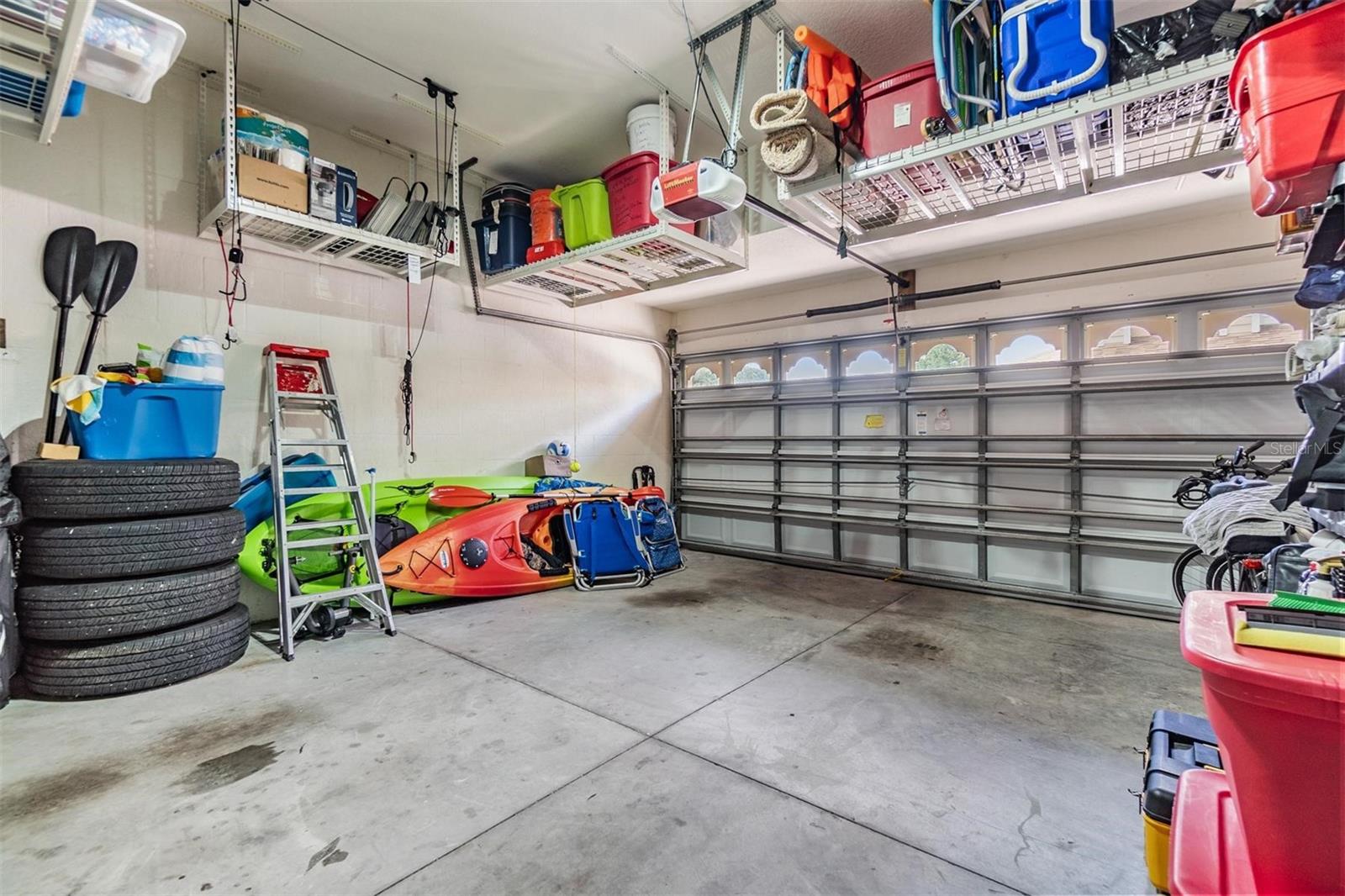 Large 2 car garage with plenty of storage.