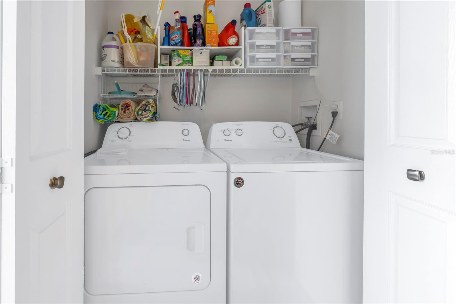 Full size washer and dryer in laundry closet