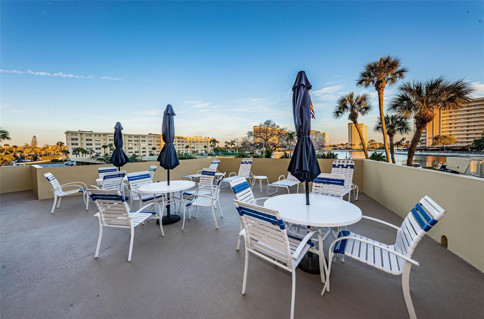 . 2nd Floor of the Columbia Enjoys a Roof Deck Overlooking the Lagoon. Each Building has It's Own Deck Area Besides Sharing Common Grounds - Pool Areas and Amenities. Shot #2..