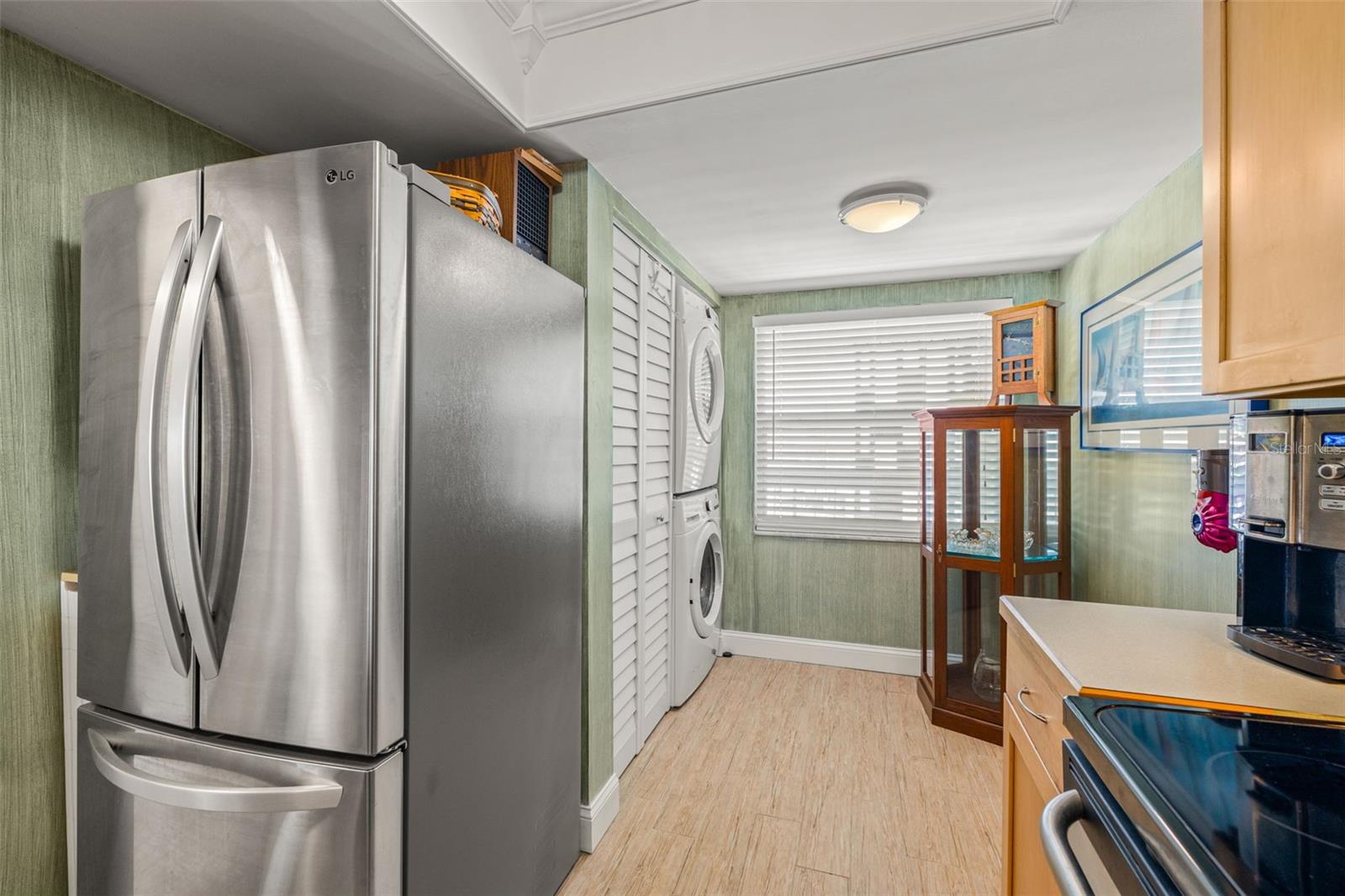 Roomy, efficient kitchen features an eat-in space or additional storage.