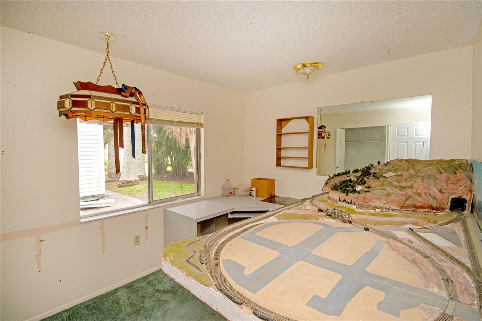 One of three downstairs bedrooms.