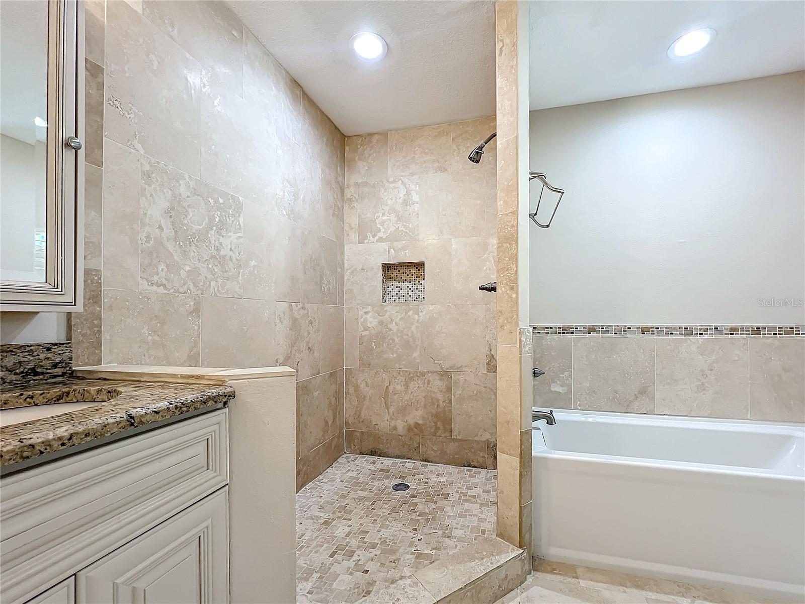 Large tiled shower w/seperate tub