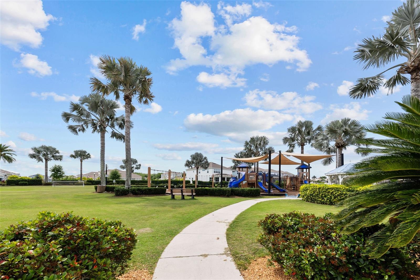 The gorgeous Mirabay Clubhouse contains Fitness Center, Grill, Lap Pool and Activity Pool with iconic Lighthouse slide, kayaks and paddleboards for use on lagoon.
