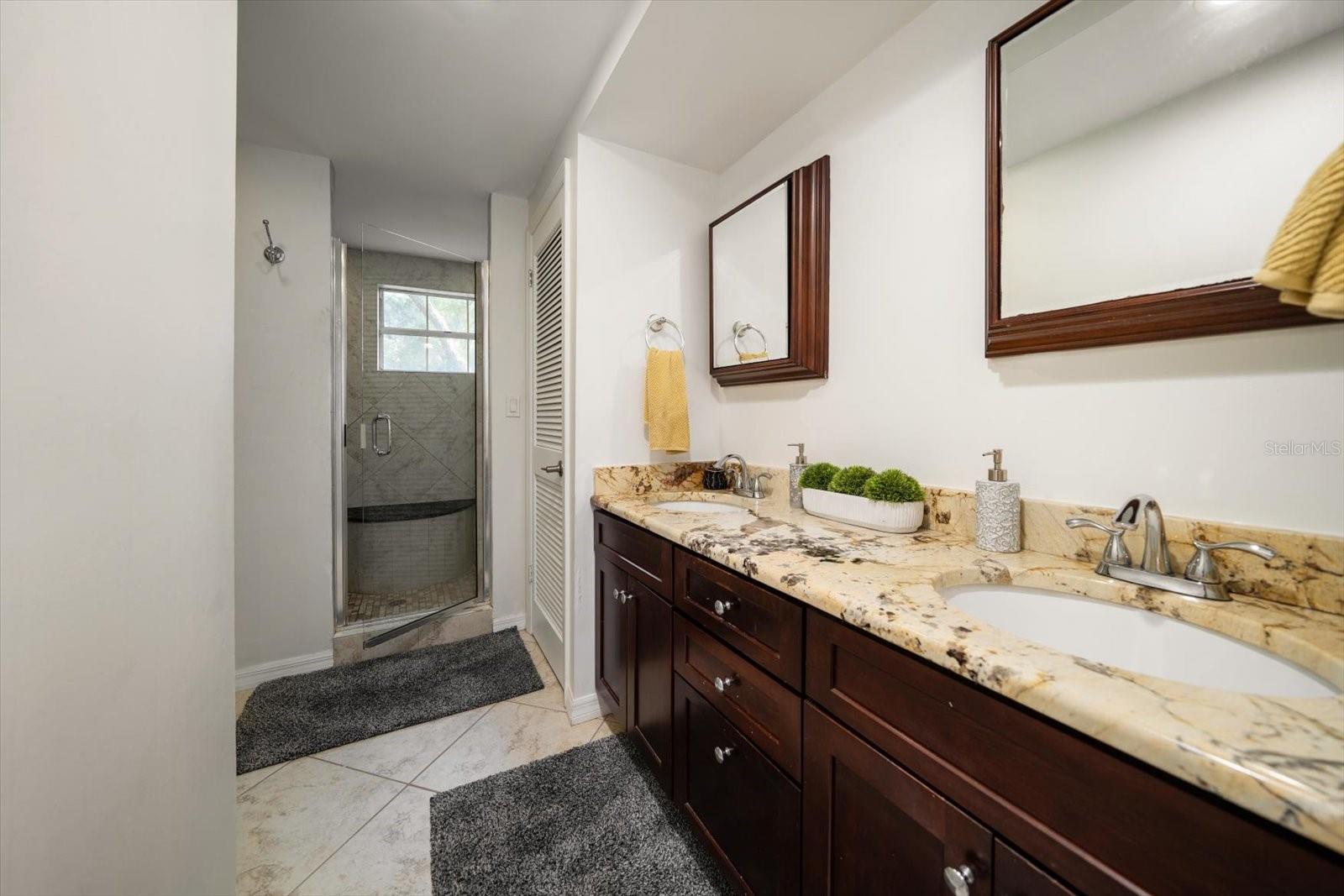 Primary bathroom with dual sinks and walk in shower!