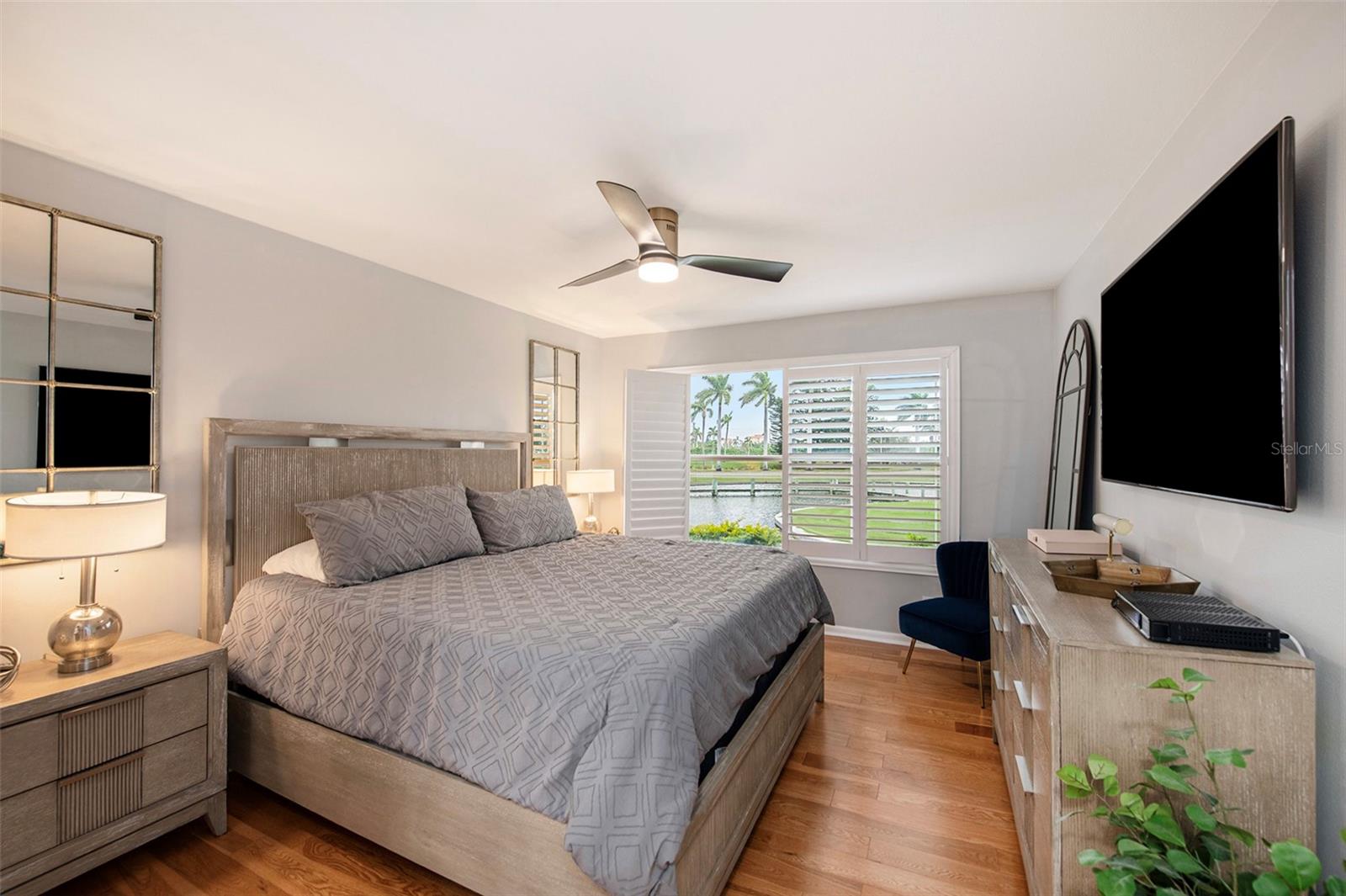 Master bedroom with large windows and shutters that can open up fully for the perfect view