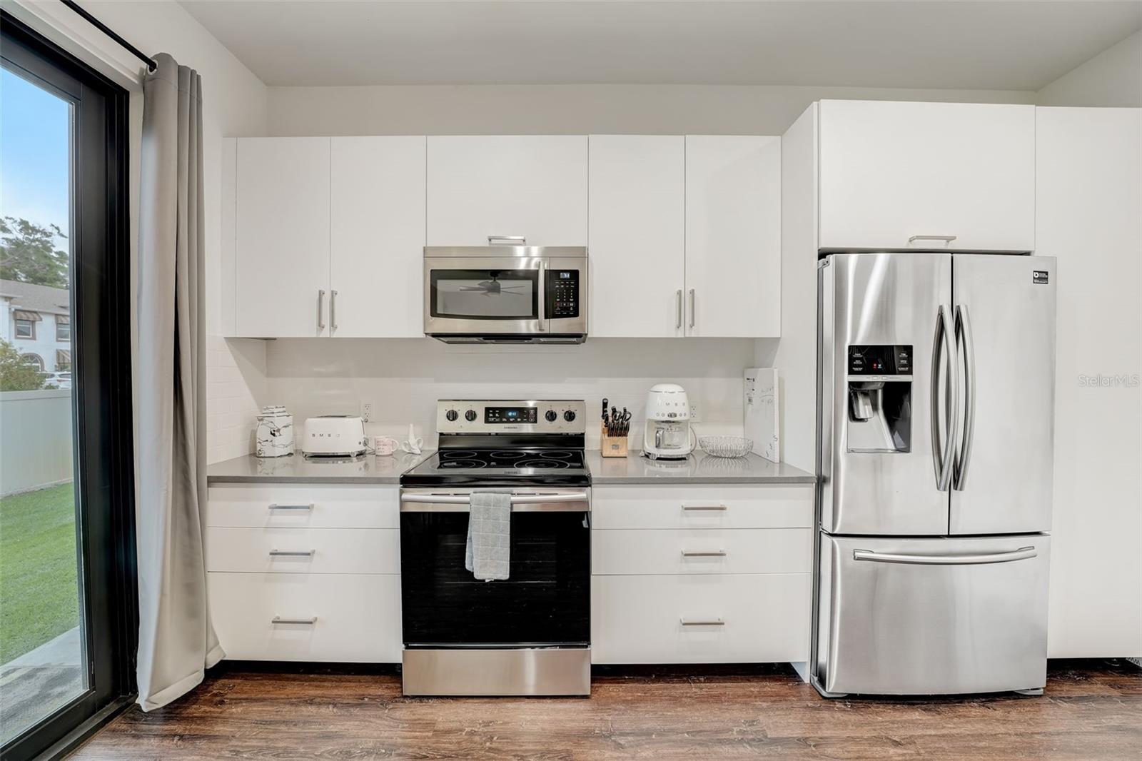 Straight on view of kitchen appliances.
