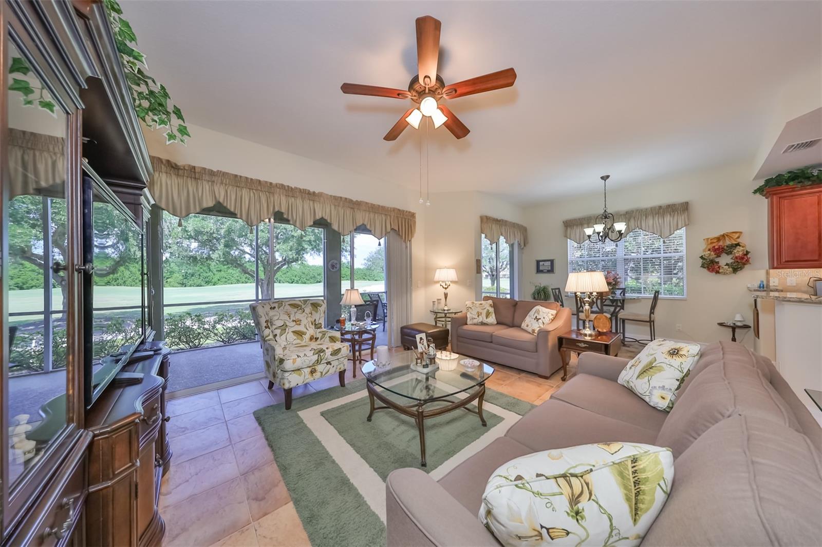 From the living room and dining room, you easily see the golf course, ponds and the Renaissance Golf & Country Club.