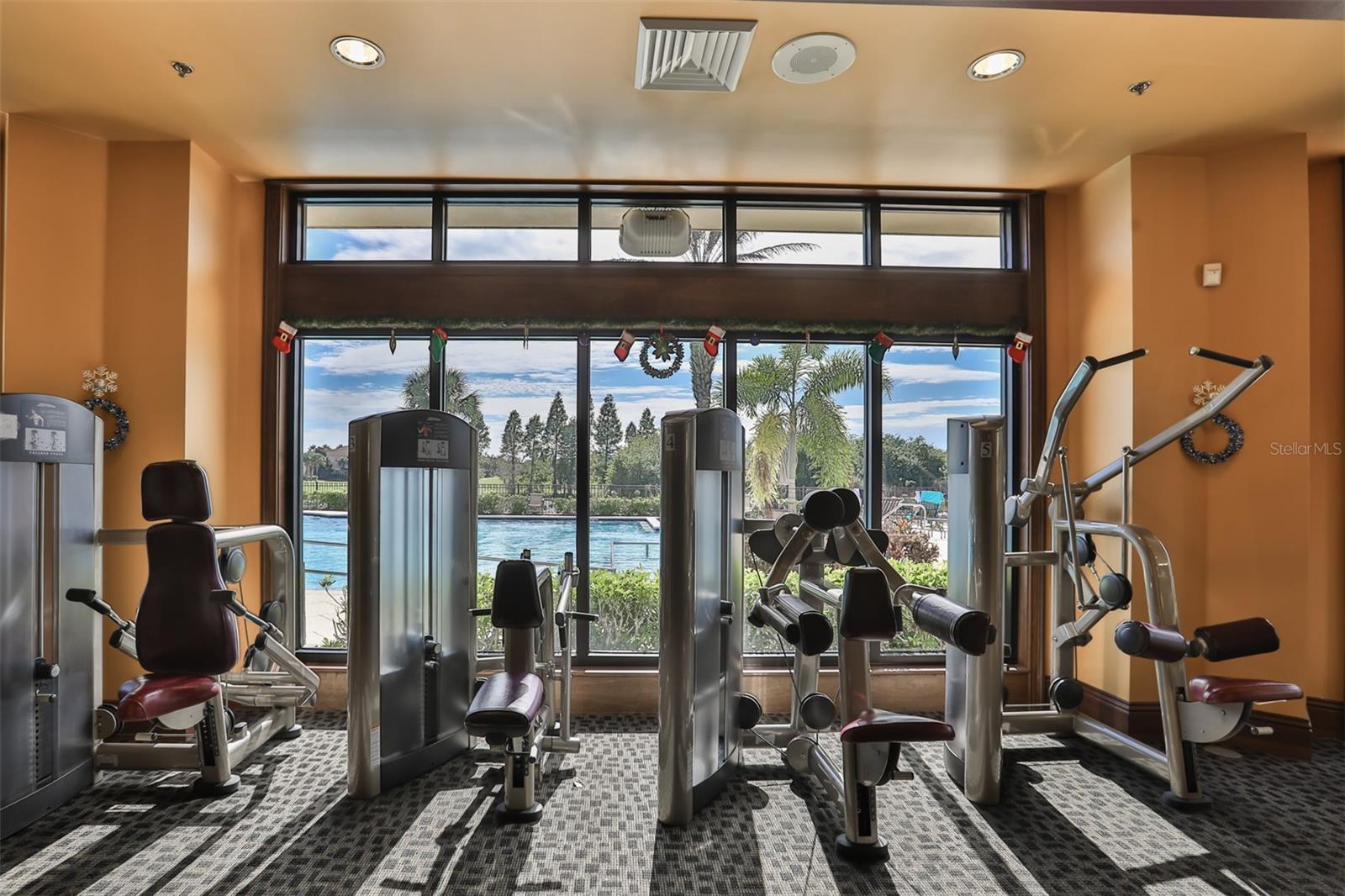 Club Renaissance fitness center is 'state of the art' and overlooks the heated pool. The indoor walking/jogging track is above on the second floor.