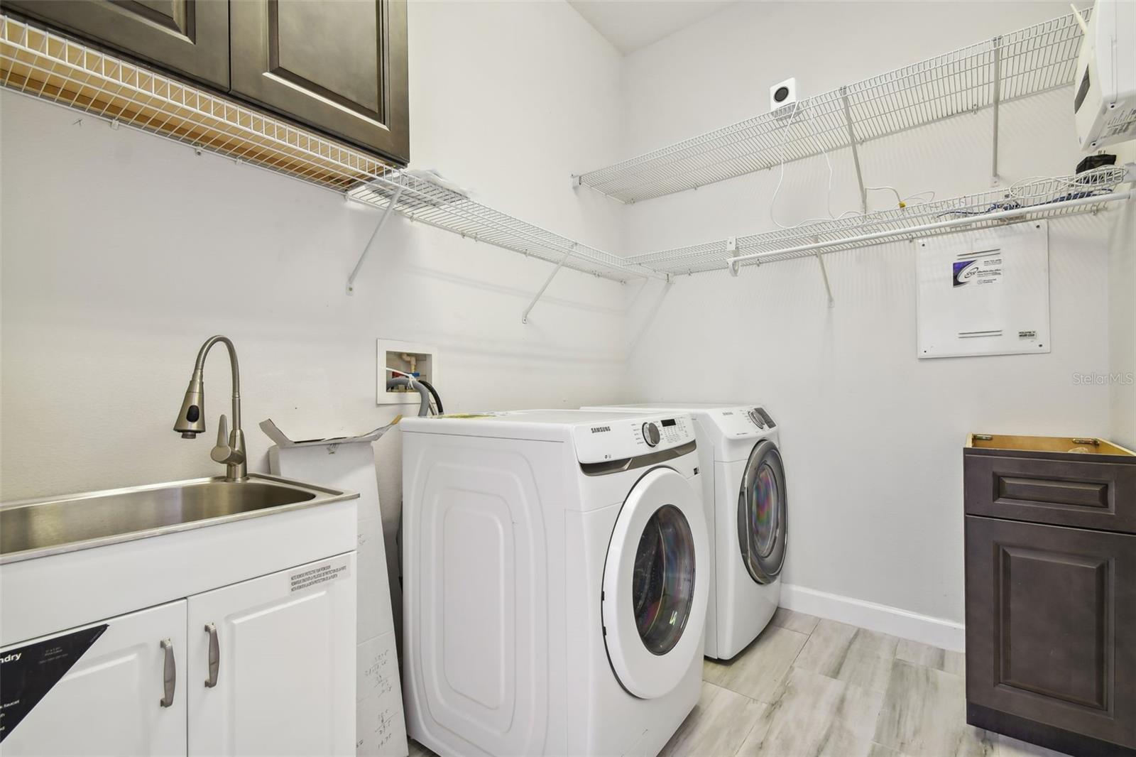 Laundry room Newer washer brand new Dryer