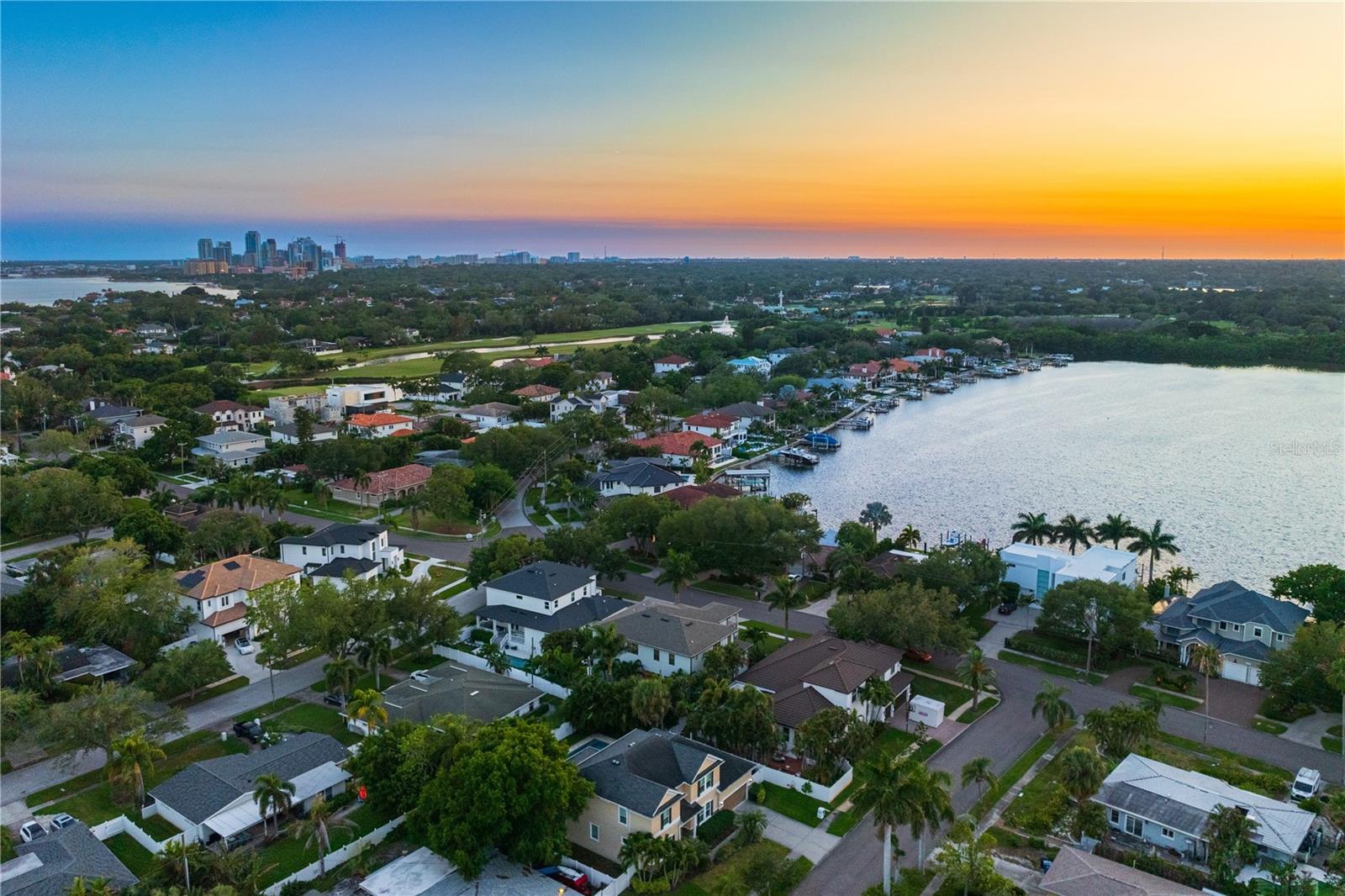 Aerial dusk views showing close proximity to downtown St. Petersburg...