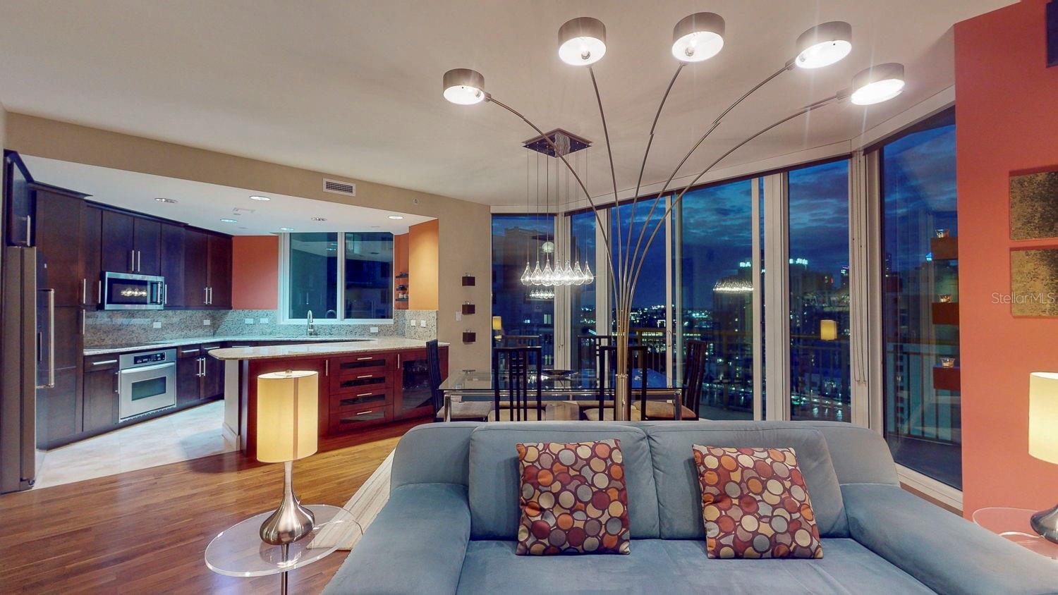 A glimpse of the living area featuring the evening skyline.