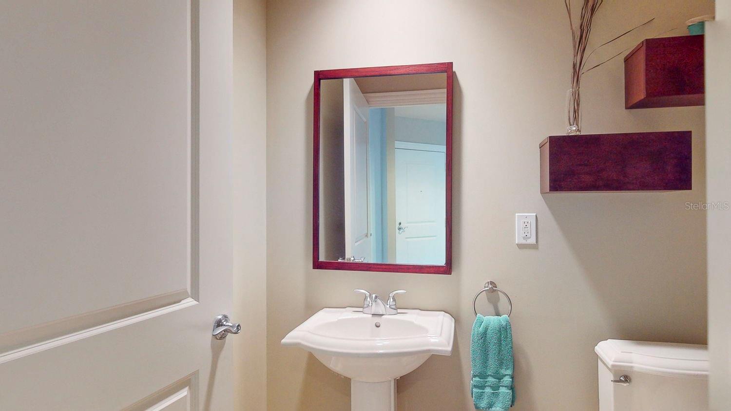 The half bath is conveniently located for guests.