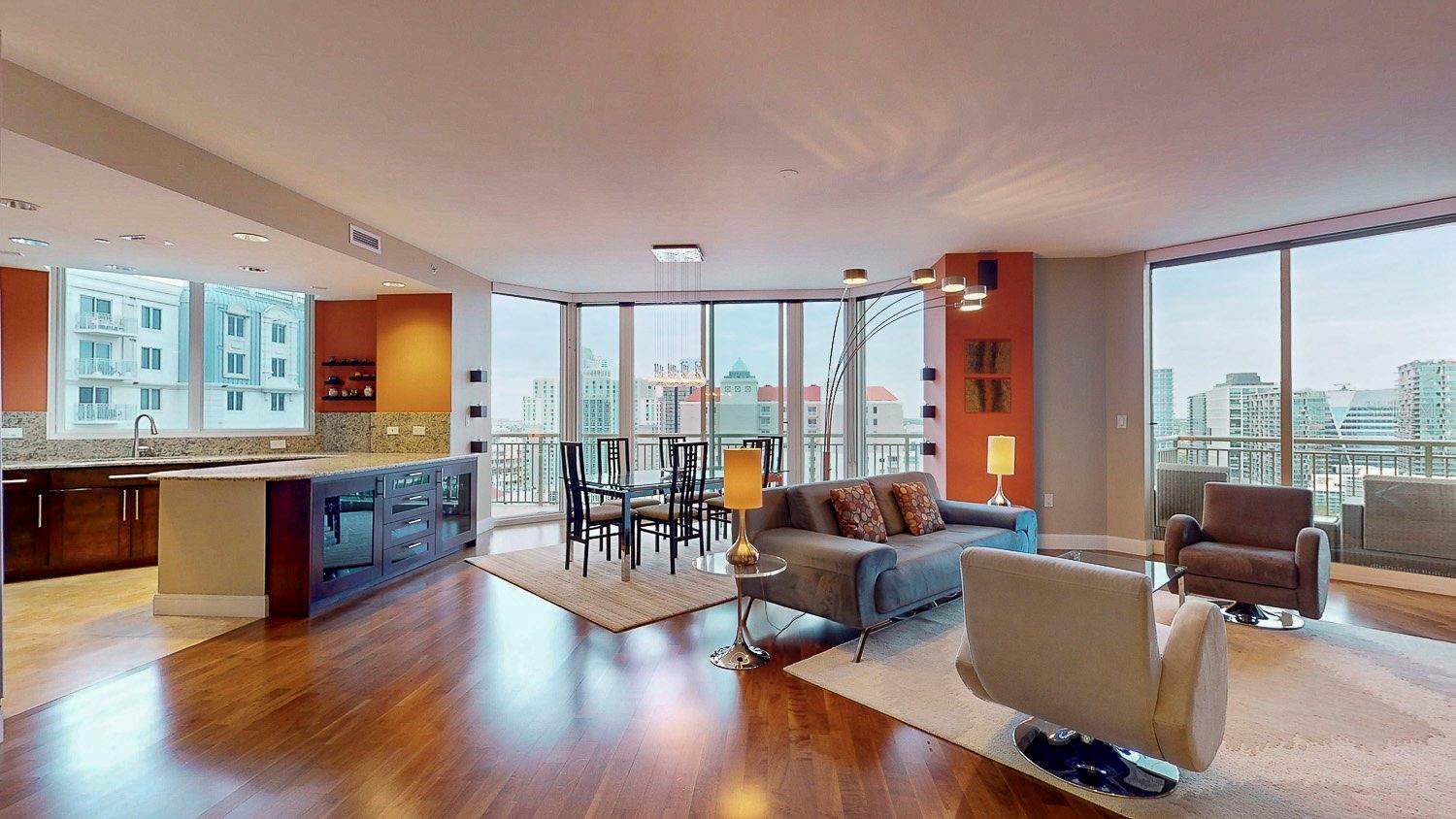 Bask in natural light and picturesque views in the living/dining area, complete with private balcony access.
