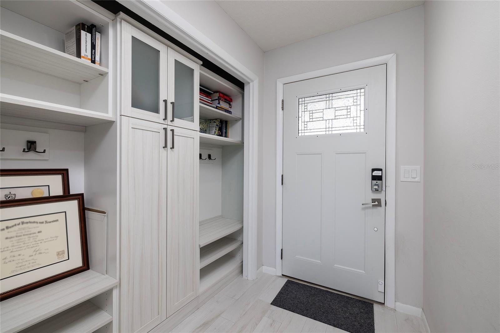 Front Entry closet with built-in features