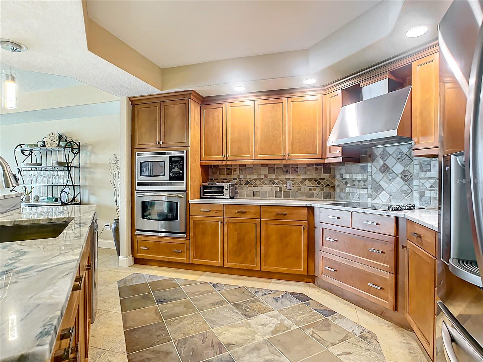 Your kitchen has ample cabinets & counter space for the gourmet cook.