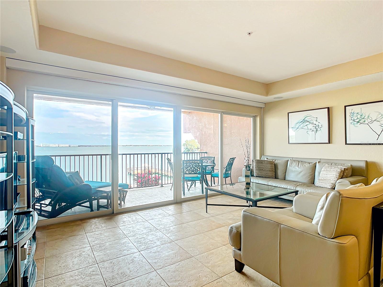 Great views from the living area looking out to your large balcony and the open water