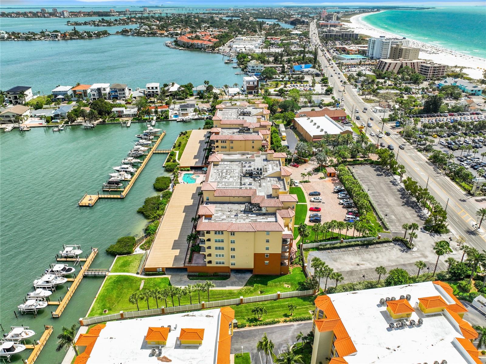 This aerial view is a side view of Boca Sands.  Notice the boat slips, fishing pier and on the other side the ample space for visitor parking.