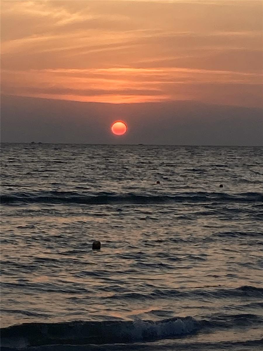 The sun setting on the beach is a beautiful thing to watch!  Remember it is steps from your condo to the beach across the street.