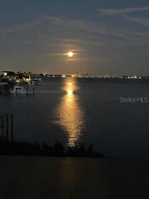 Great picture of the full moon rising and the reflection on the  water.  This picture was taken right from the back balcony.