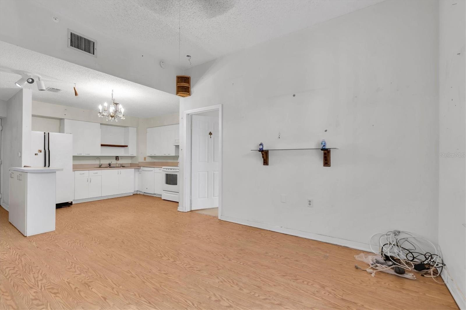 Kitchen has nice size plenty of cupboard and counter space. The openness to living area makes it wonderful for entertaining!