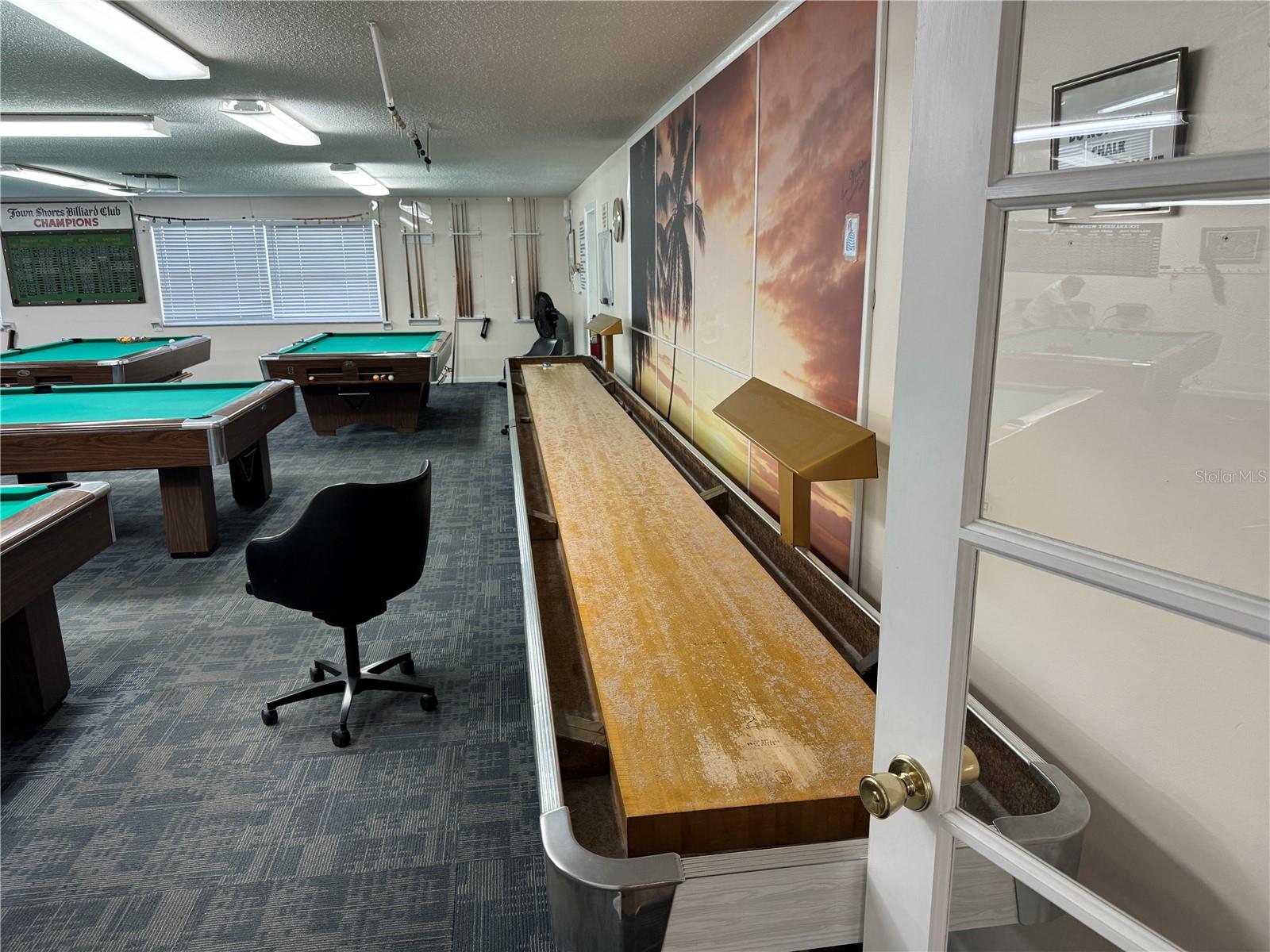 There's always time for a quick game of indoor shuffleboard