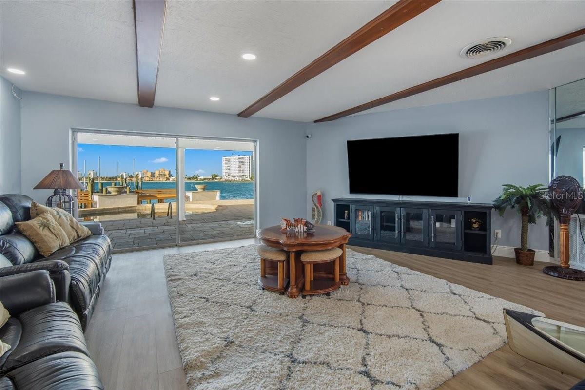 An alternative angle highlighting the open and spacious family room and still showing off the gorgeous water views.