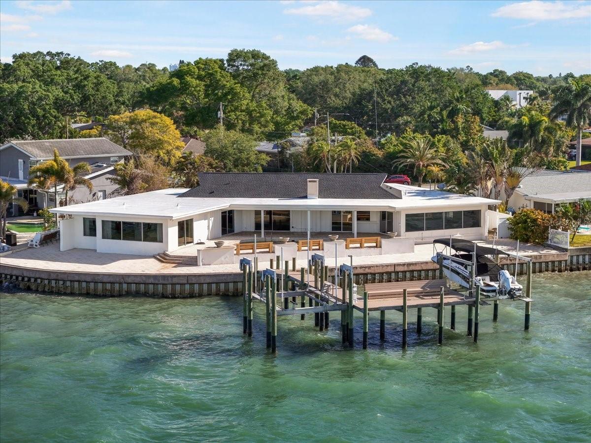 This Florida coastal property is perfect for boating enthusiasts, featuring two boats lifts capable of accommodating a boat of up to 40 feet in length.