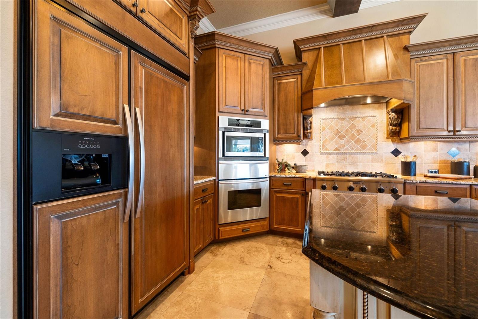 Expansive Kitchen with Thermador gas range