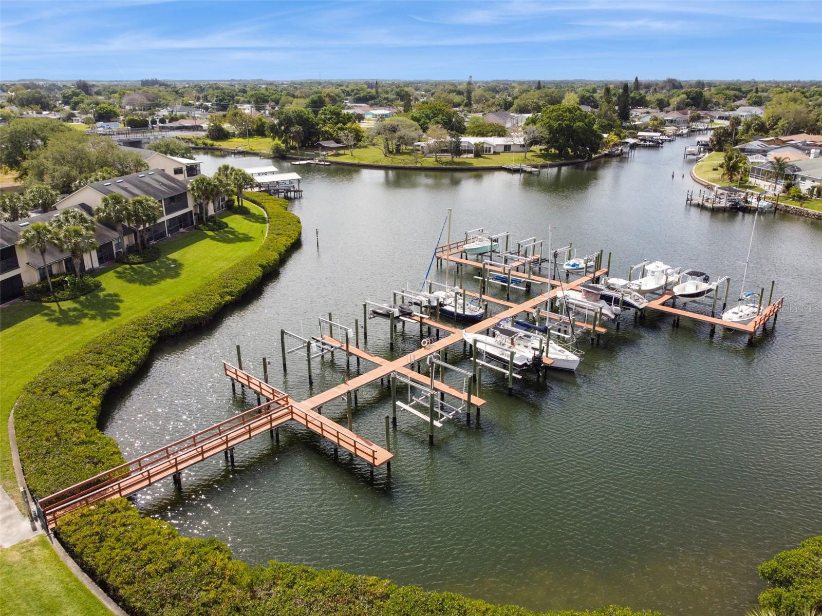 Home includes a deeded boat slip with a new 10,000 lb lift and Gem remote.