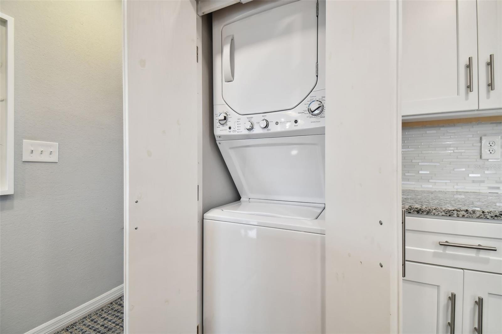 Stackable washer and dryer stay with the home
