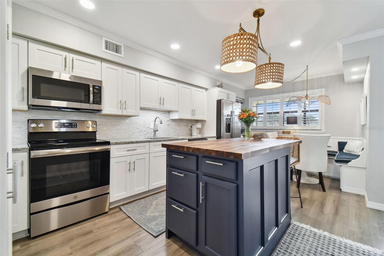 Beautifully updated kicthen with dinette and wine bar!