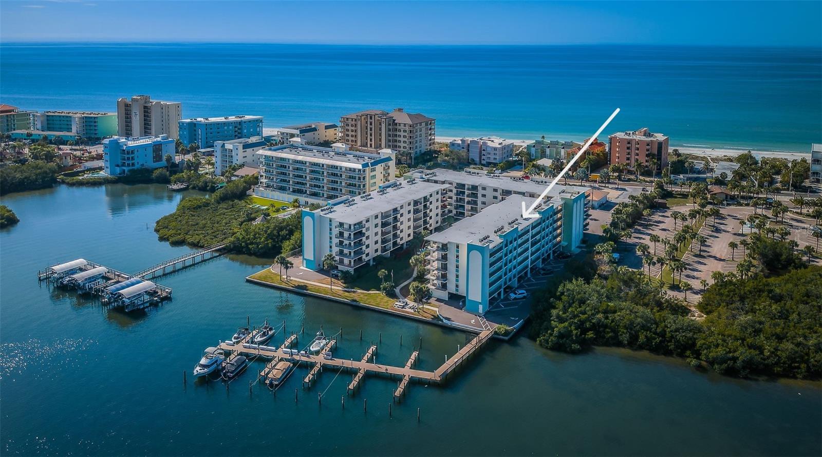 Golden Shores Condos aerial view with Community Boat Slips - First Come, First Serve!
