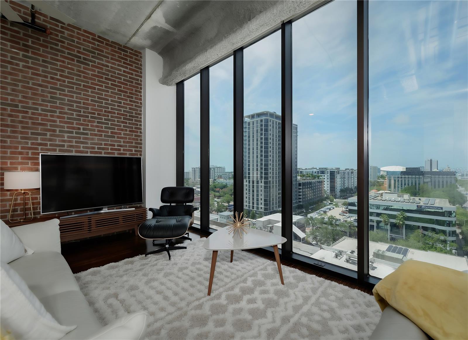 Living Room with West Facing City View
