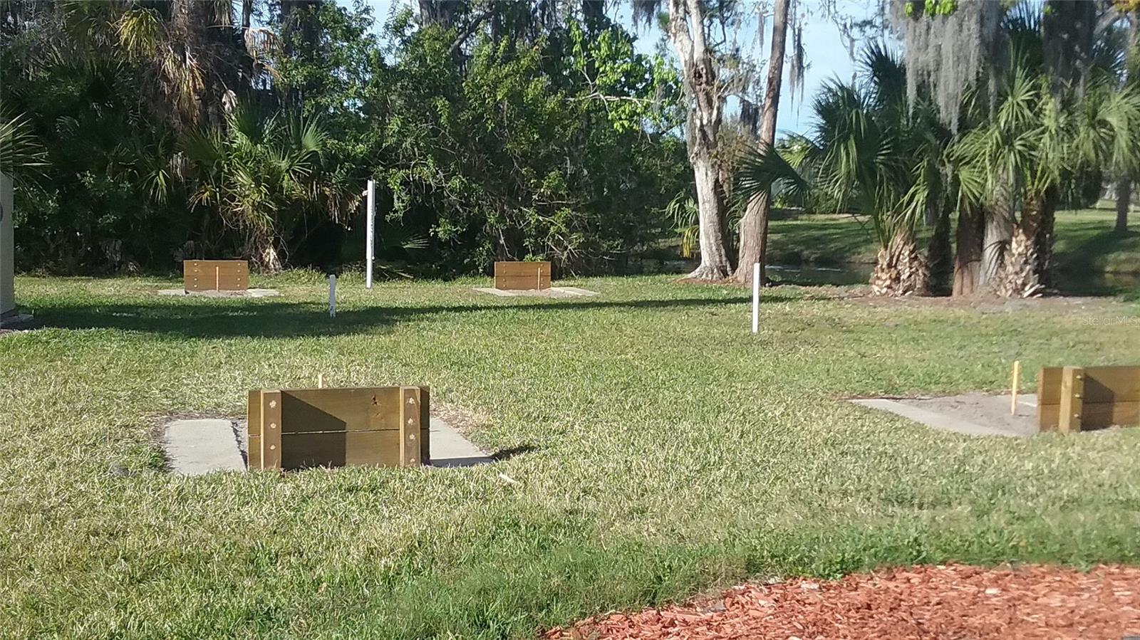 HORSE SHOE PITS FOR THOSE WHO WANT TO PARTAKE.  THERE ARE ALSO BOCCE' BALL COURTS AND SHUFFLE BOARD COURTS.