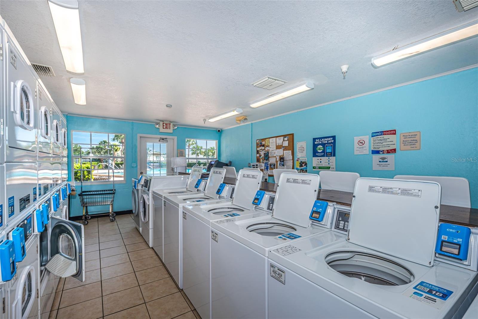 Several laundry machines, including large 1's for comforters