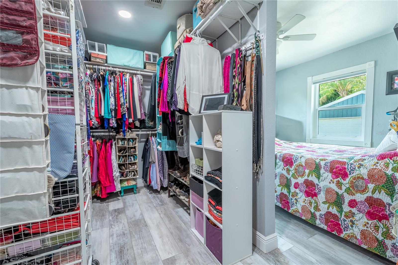 The primary bedroom features a large walk-in closet that can easily be reconfigured to add space to the bedroom.