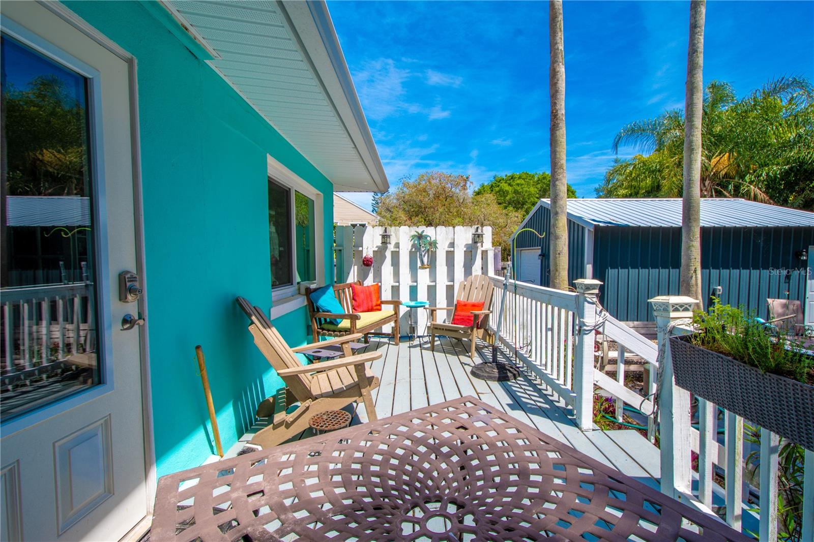 The backyard sun deck is the quintessential spot to relax and unwind.
