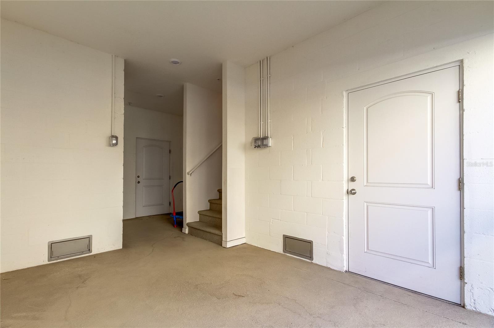 1st floor - Area where the 2 Storage Closets, Door leading to garage & Water Softener closet is located