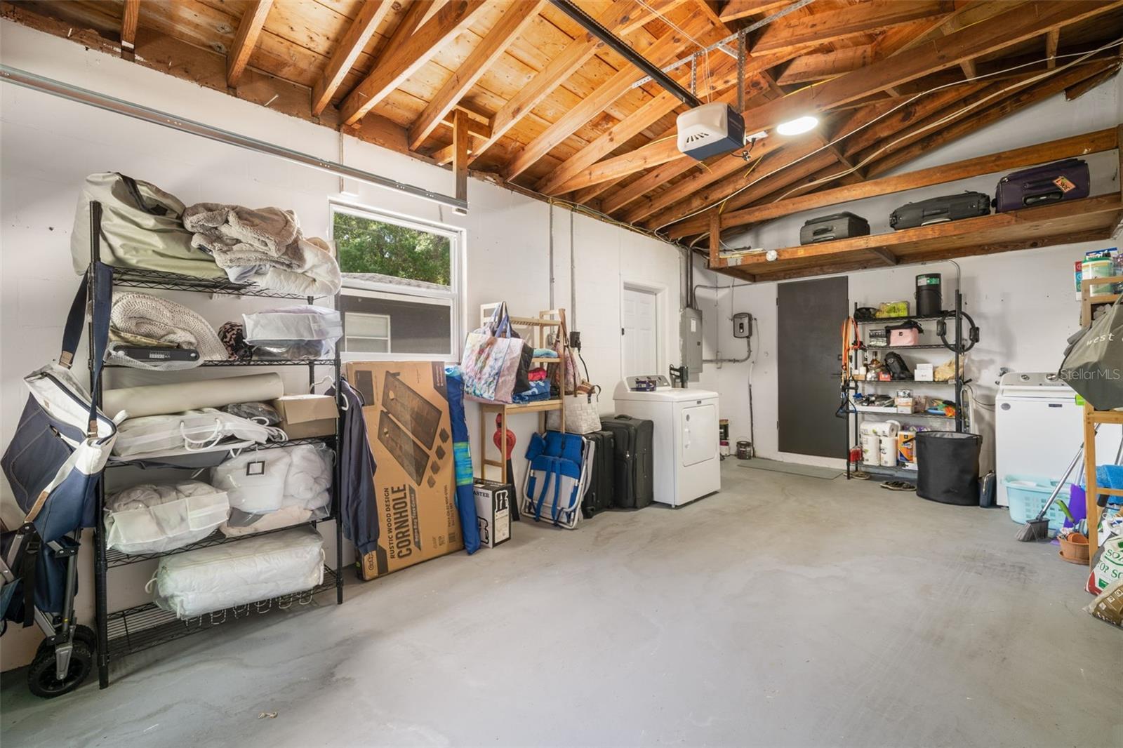 Over-sized Garage with painted floor.