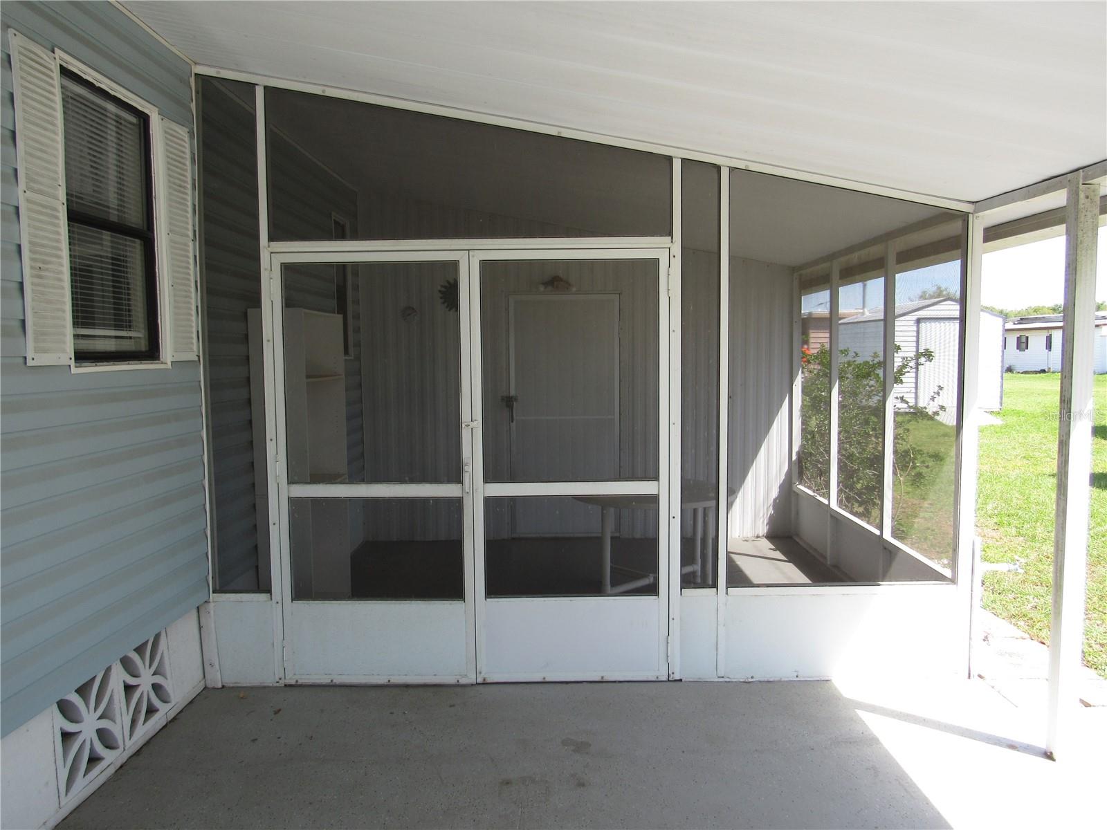 Attached screen porch.