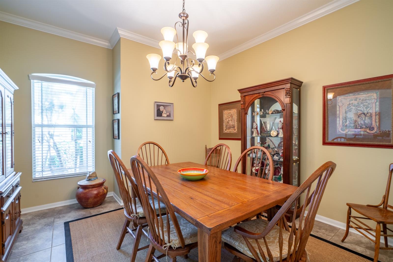 FORMAL DINING ROOM HAS CROWN MOLDING