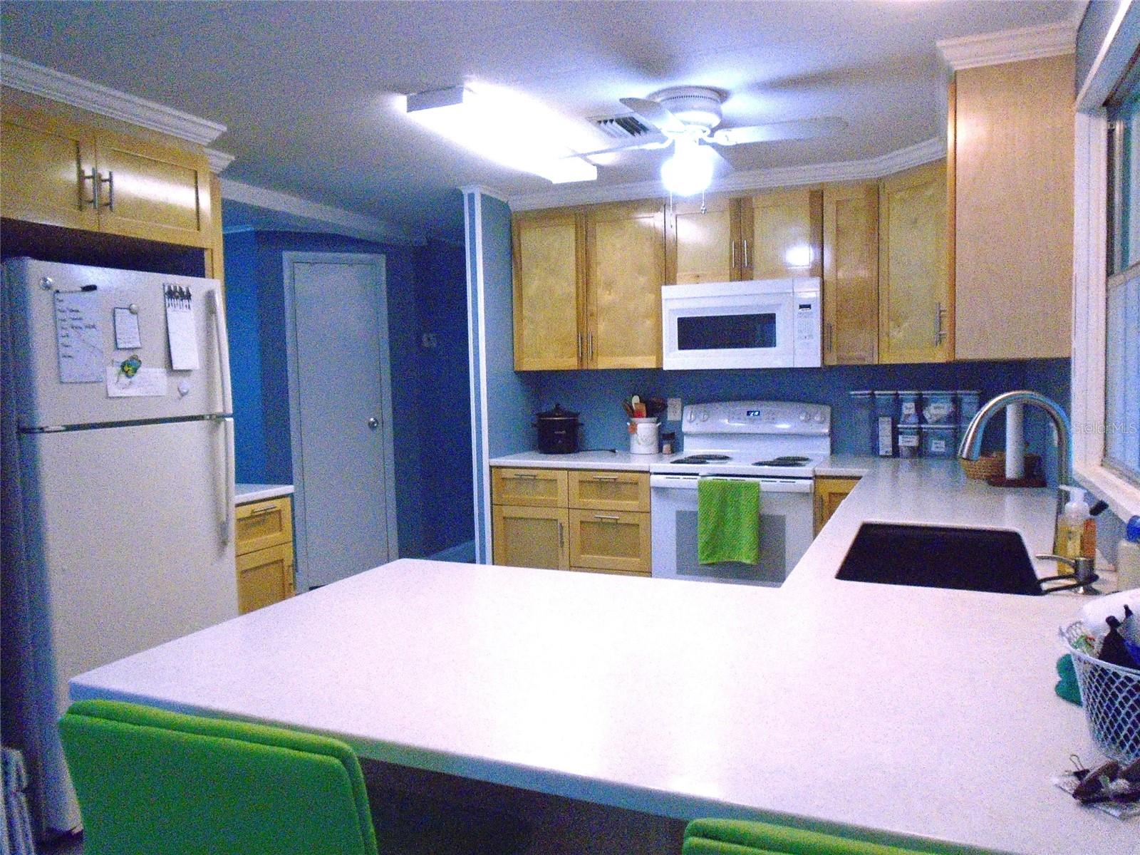 Room for Two in the Remodeled Kitchen * Solid Wood Soft Close Cabinets * Quartz Counter Tops * Recessed Sink
