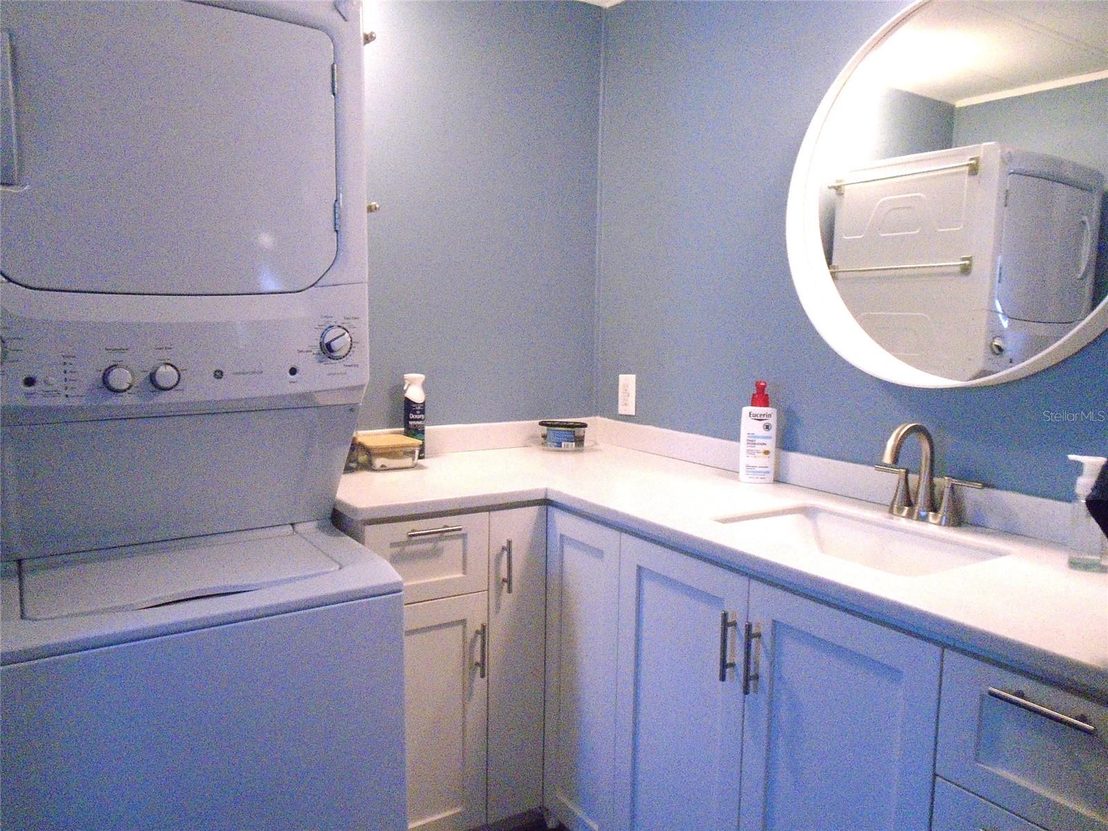 Ensuite Bathroom has Stackable Washer and Dryer * Upgraded Quartz Counter Tops and Nearly New Cabinets