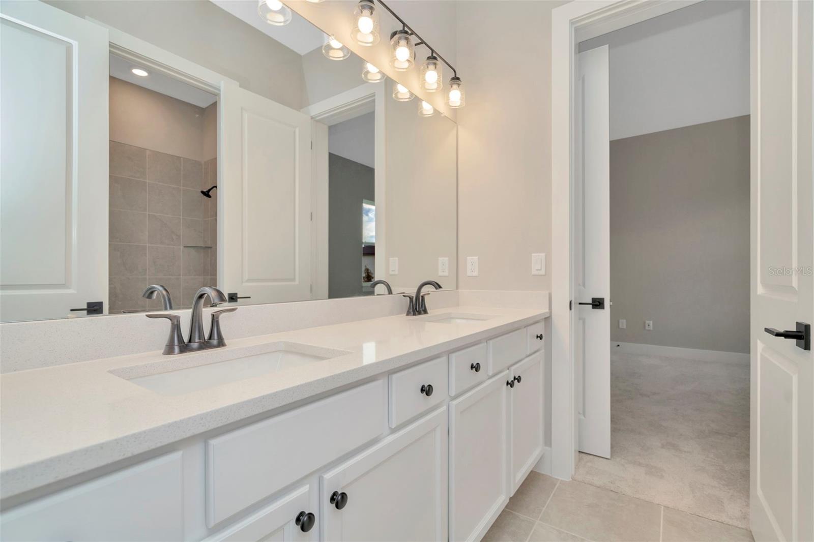 Jack and Jill Bathroom with Dual Vanities