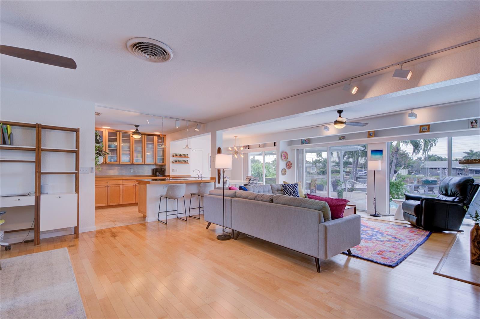 Enter into beautiful open floor plan living room, dining room, kitchen.